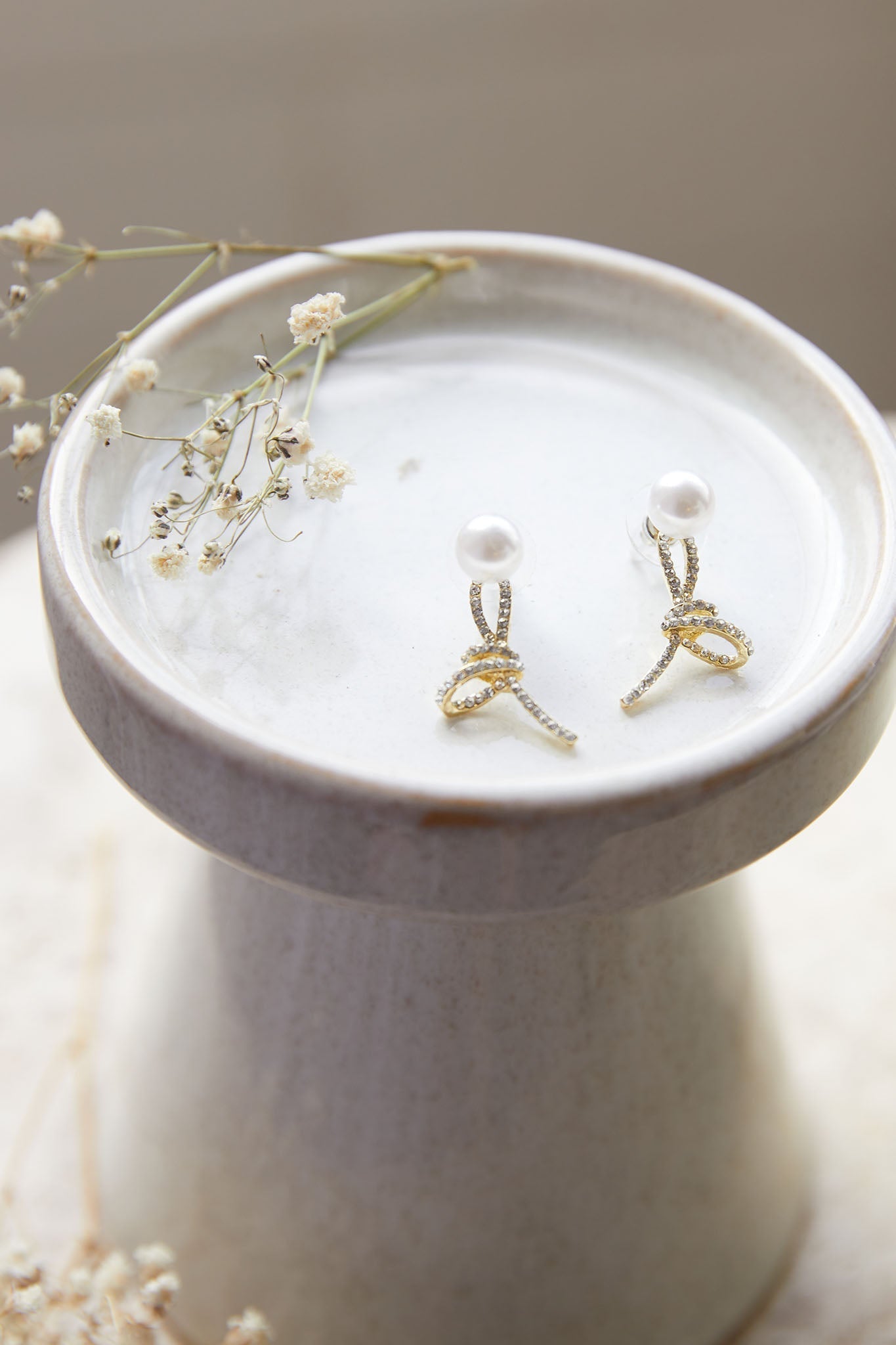 Knot Carrie Gouden Kristallen Pareloorbellen - Bellanza