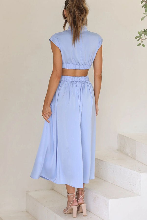 Quincy | Midi - jurk met Cut - Out en Zakken - bellanza