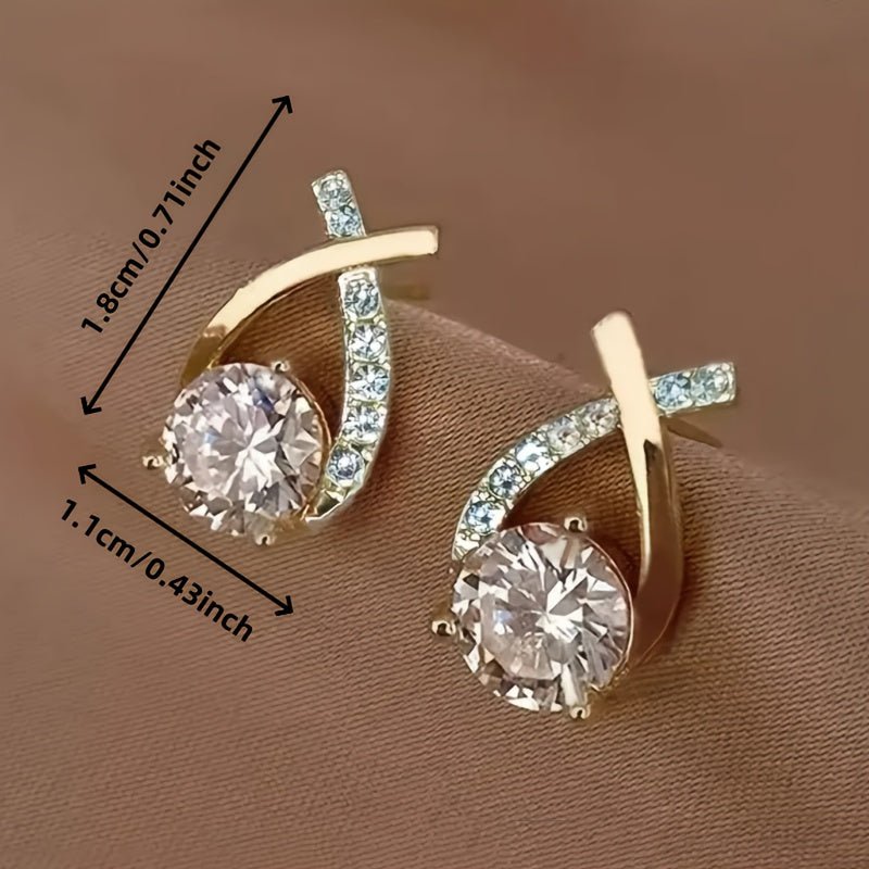 Oorbellen met gouden kruis en zirconia - Bellanza