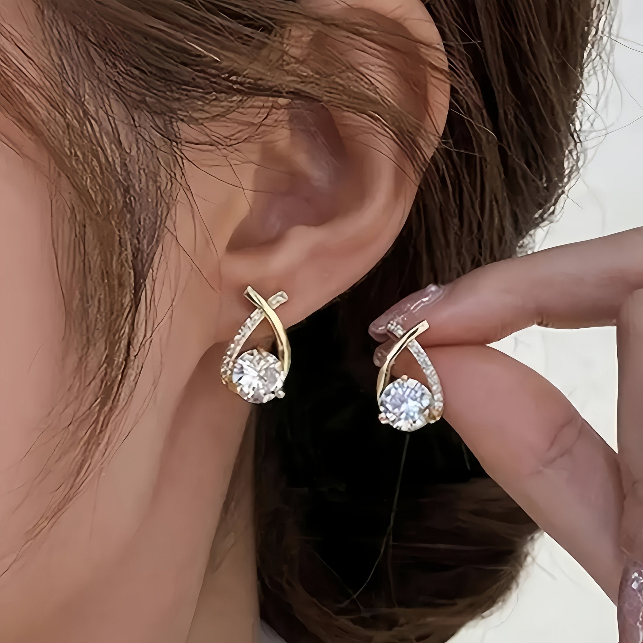 Oorbellen met gouden kruis en zirconia - Bellanza