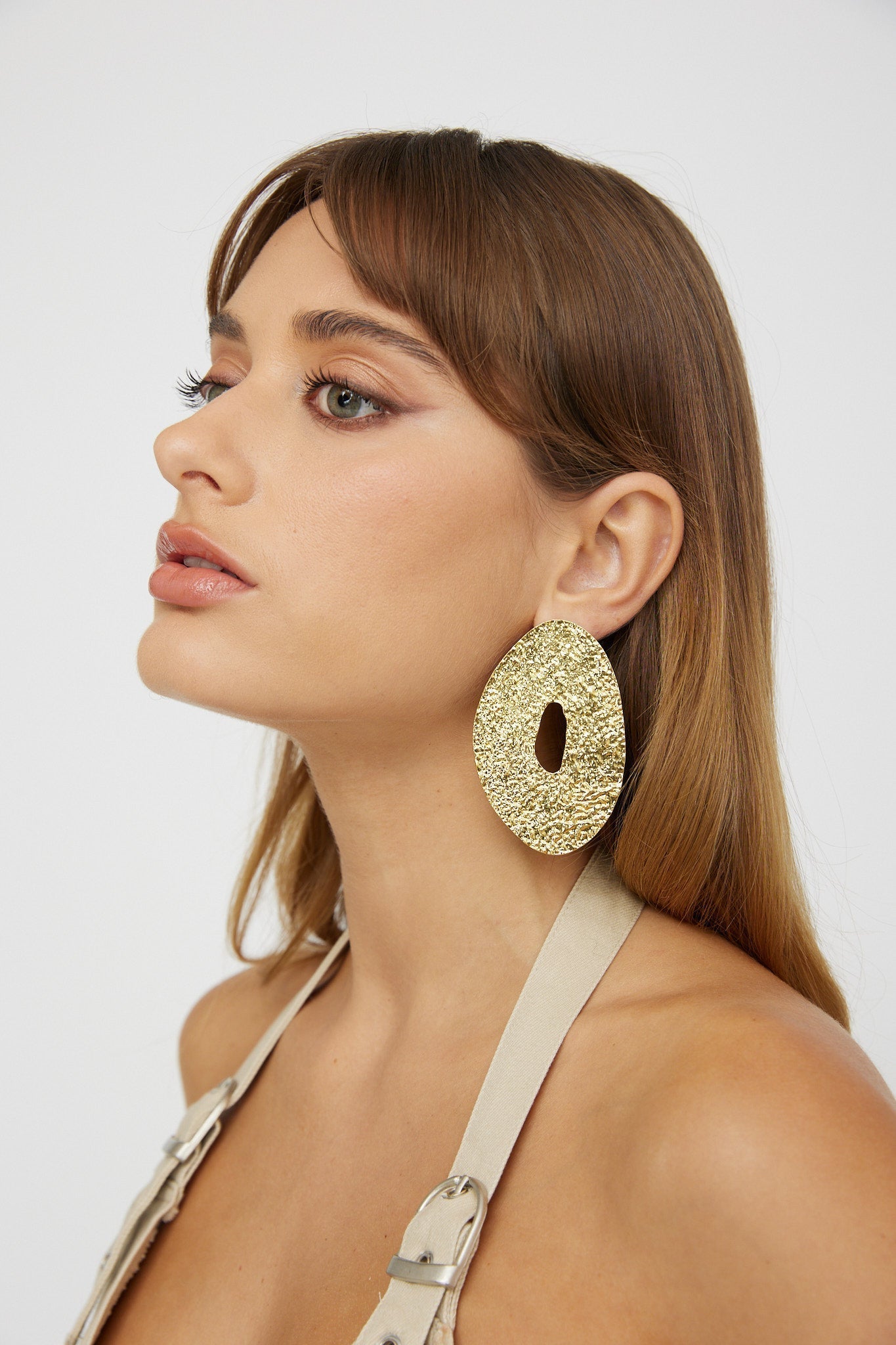 Relief disc oorbellen Eldorado Goud - Bellanza