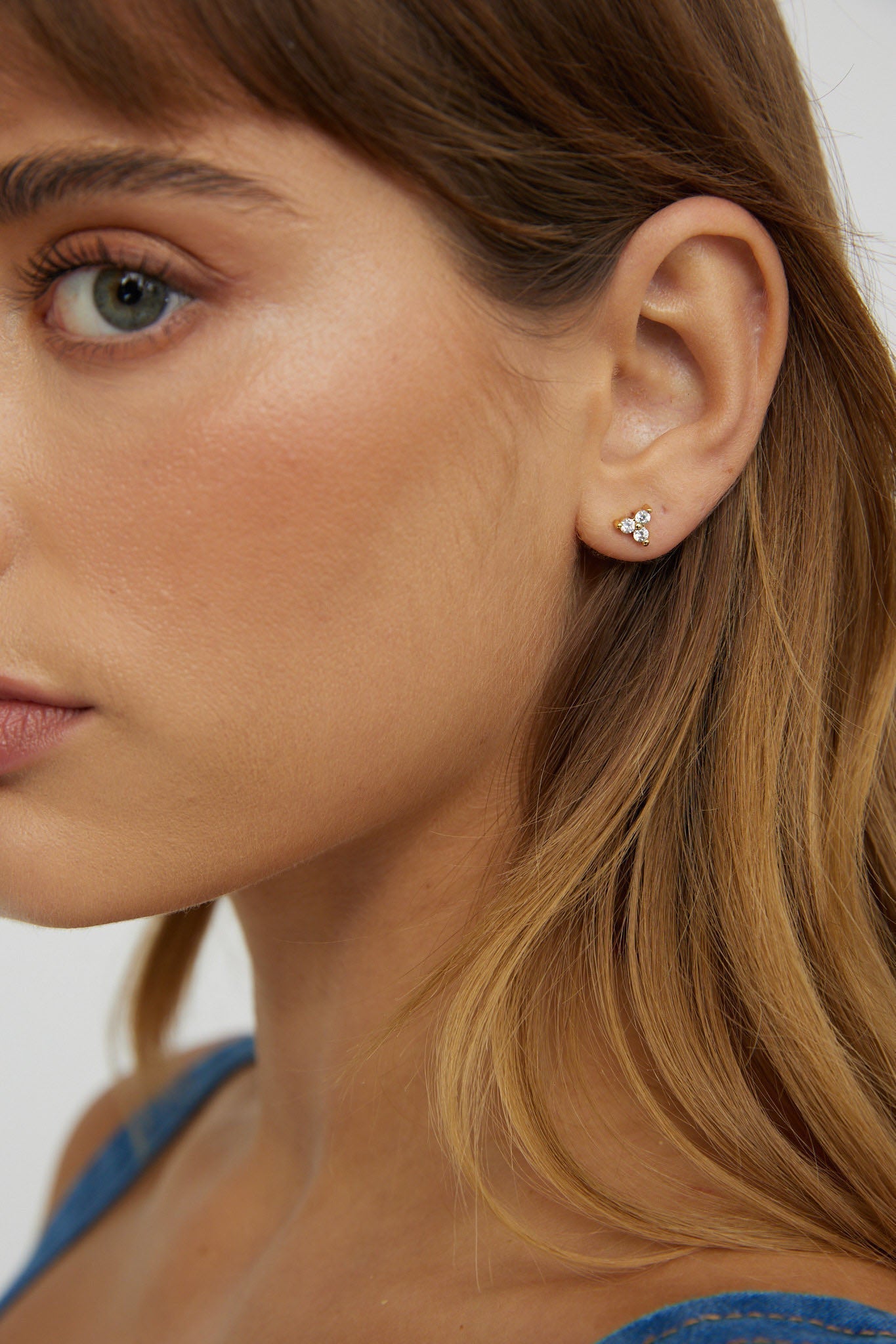 Trinity oorbellen met zirconium in goud - Bellanza